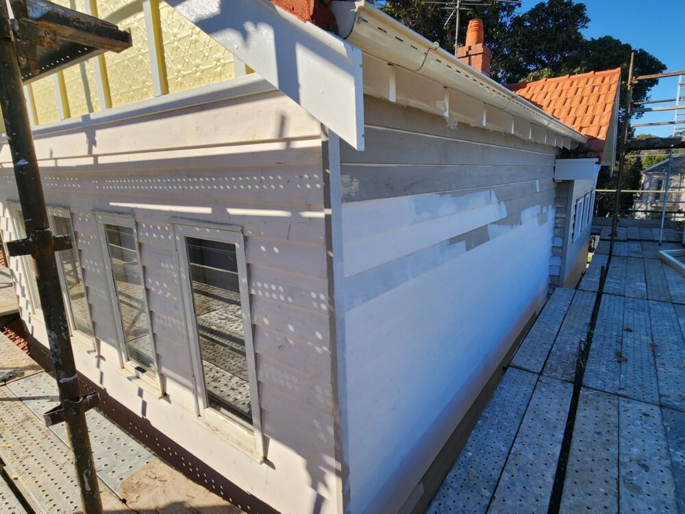 Exterior timber repairs before repainting