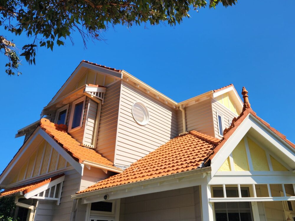 Double-storey weatherboard home in Melbourne after repaint